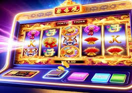 player using mobile phone to access juan 365 app fish game room selection screen